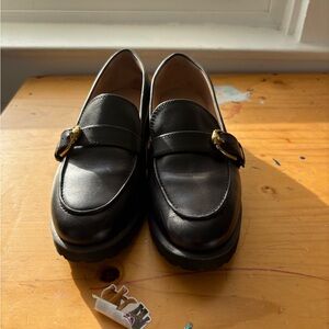 Cole Haan Black Leather Loafers with Gold Accent